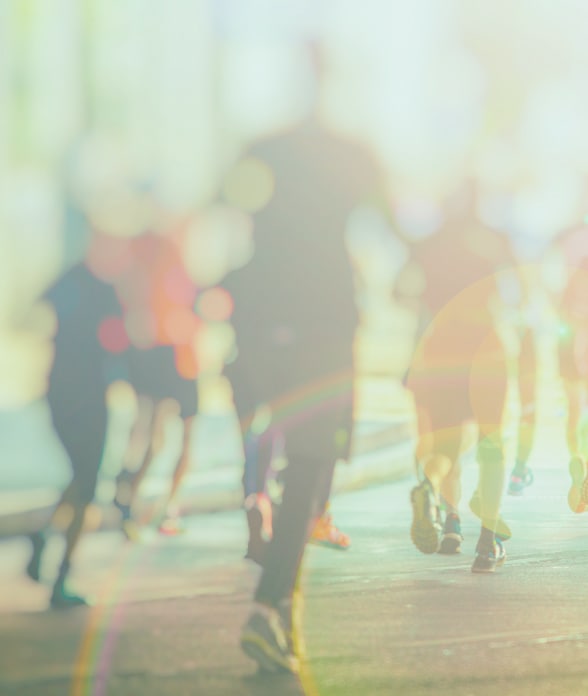 Silhouette of runners at golden hour